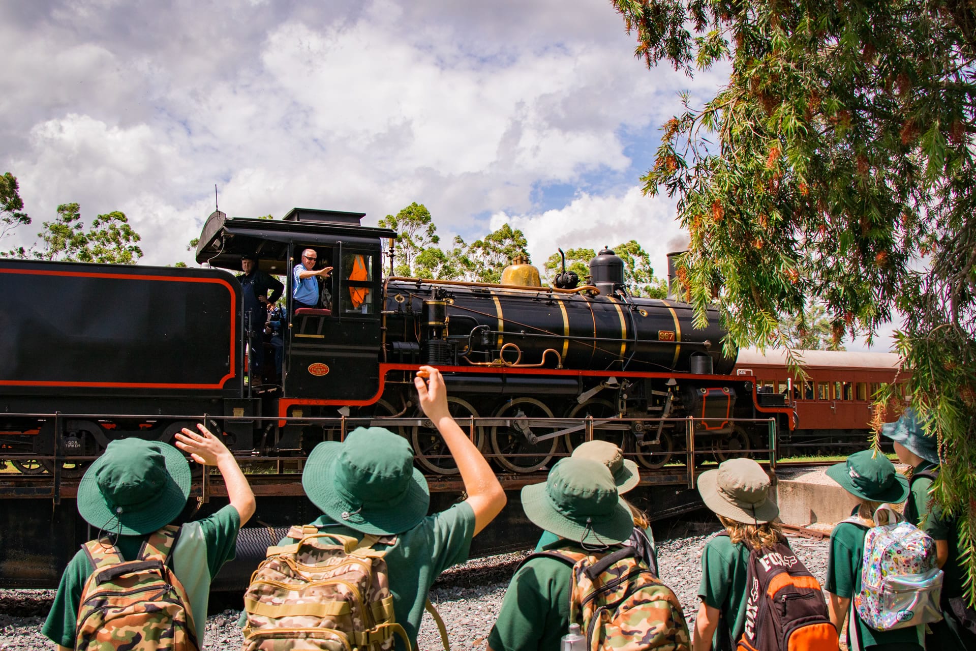 Andrew Farriss gets on board Mary Valley Rattler steam train to